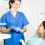 dental assistant explaining options for orthodontics